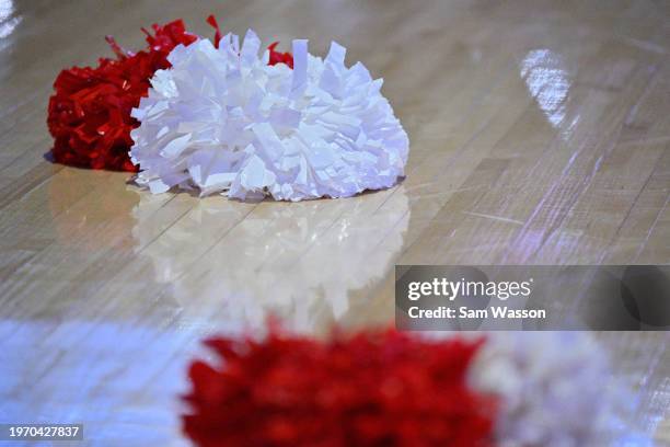 Pom poms are placed on the court during player introductions before a game between the Nevada Wolf Pack and the New Mexico Lobos at The Pit on...