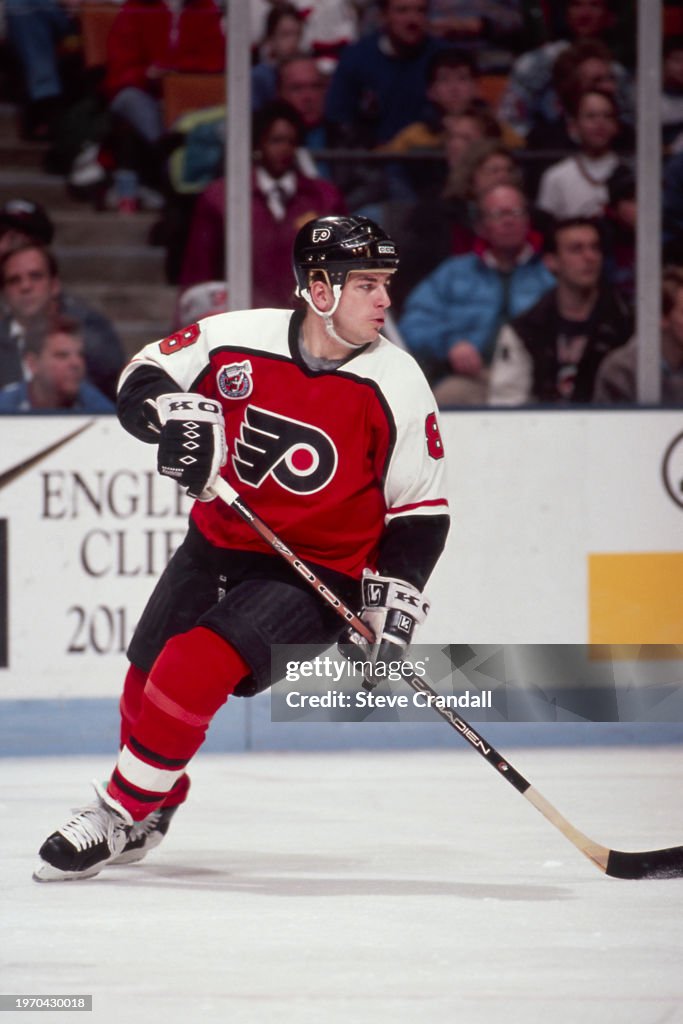 Philadelphia Flyers forward, Mark Recchi , curls back into the... News ...