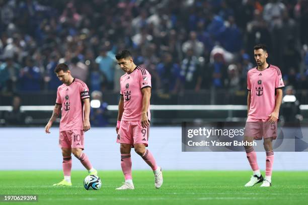 Lionel Messi, Luis Suarez and Sergio Busquets of Inter Miami look dejected after conceding their team's second goal which was scored by Abdullah...