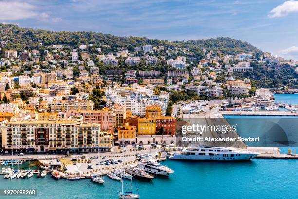 lympia port and nice cityscape on a sunny summer day, cote d'azur, france - nizza foto e immagini stock