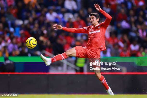 Carlos Orrantia of Toluca runs with the ball during the 3rd round match between Puebla and Toluca as part of the Torneo Clausura 2024 Liga MX at...
