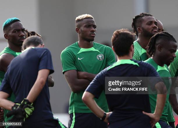 Nigeria's forward Victor Osimhen looks on during a training session at the National Police School stadium in Abidjan on February 1, 2024 on the eve...