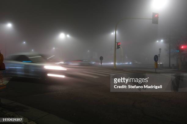 fog in milan - pollution in milan stock pictures, royalty-free photos & images