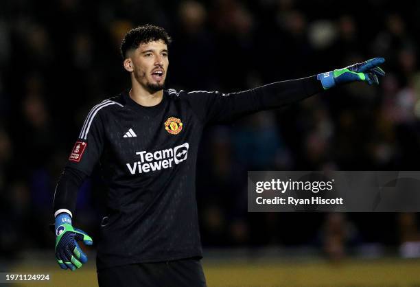 Altay Bayindir of Manchester United gestures during the Emirates FA Cup Fourth Round match between Newport County and Manchester United at Rodney...