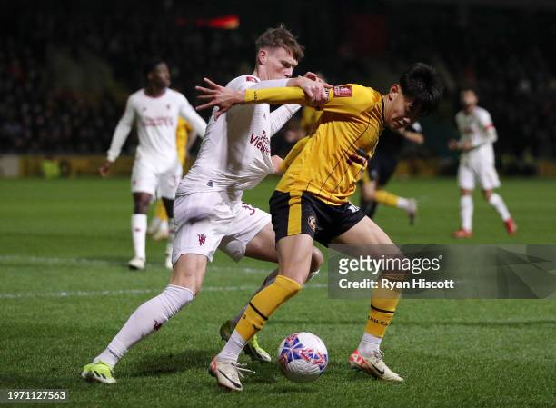 Kiban Rai of Newport County controls the ball whilst under pressure from Scott McTominay of Manchester United during the Emirates FA Cup Fourth Round...
