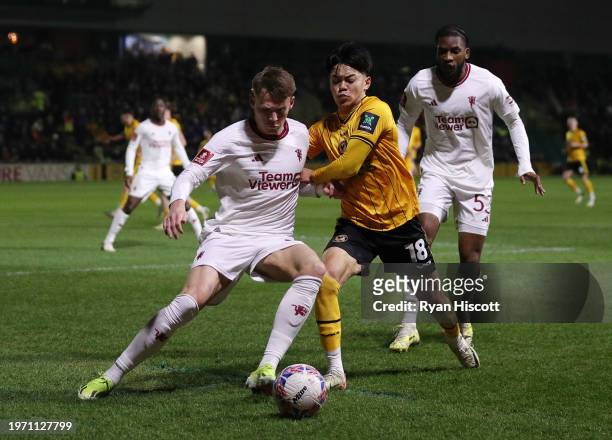 Scott McTominay of Manchester United controls the ball whilst under pressure from Kiban Rai of Newport County during the Emirates FA Cup Fourth Round...
