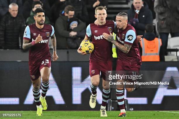 James Ward-Prowse of West Ham United celebrates after scoring with Emerson Palmieri of West Ham United and Kalvin Phillips of West Ham United during...