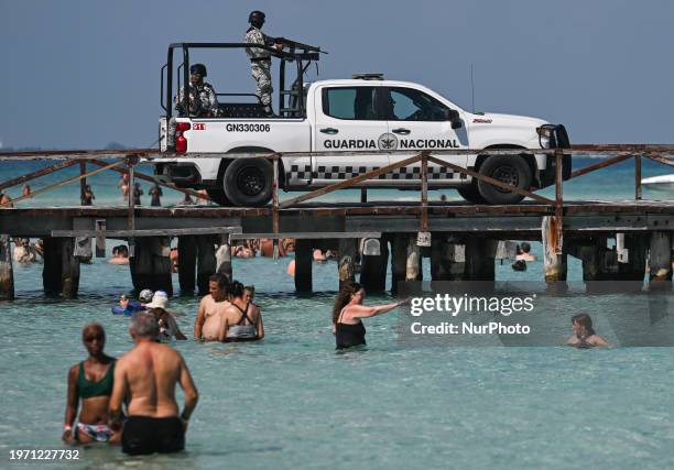 Members of the National Guard patrolling the beachside in Isla Mujeres, on December 5 in Isla Mujeres, Quintana Roo, Mexico.