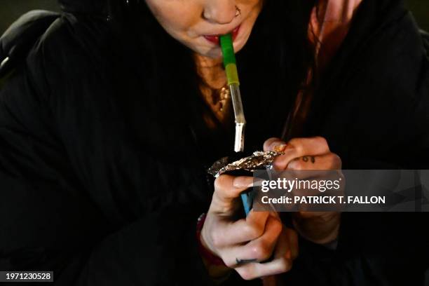 "Jae" uses fentanyl on Park Avenue following the decriminalization of all drugs in downtown Portland, Oregon on January 23, 2024. When police officer...