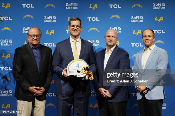 Inglewood, CA Chargers Owner and Chairman of the Board Dean Spanos, left, President of Business Operations John Spanos, right, and Chargers new...