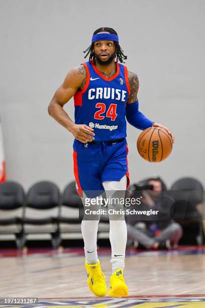 Zavier Simpson of the Motor City Cruise handles the ball during the first quarter of the game against the Indiana Mad Ants on February 1, 2024 at...