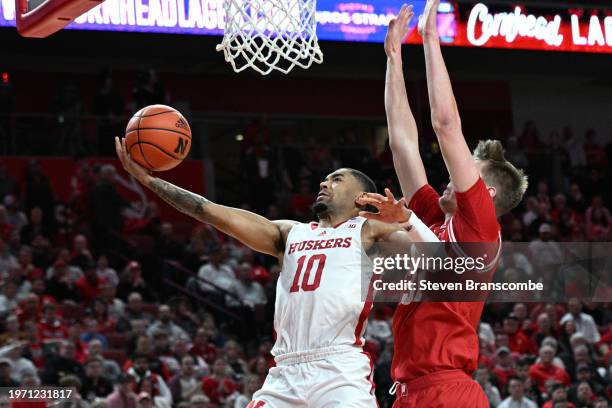 Jamarques Lawrence of the Nebraska Cornhuskers puts up a shot and scores against Nolan Winter of the Wisconsin Badgers in the first half at Pinnacle...