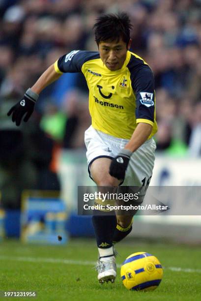 November 26: Young-pyo Lee of Tottenham Hotspur on the ball during the Premier League match between Wigan Athletic and Tottenham Hotspur at Jjb...