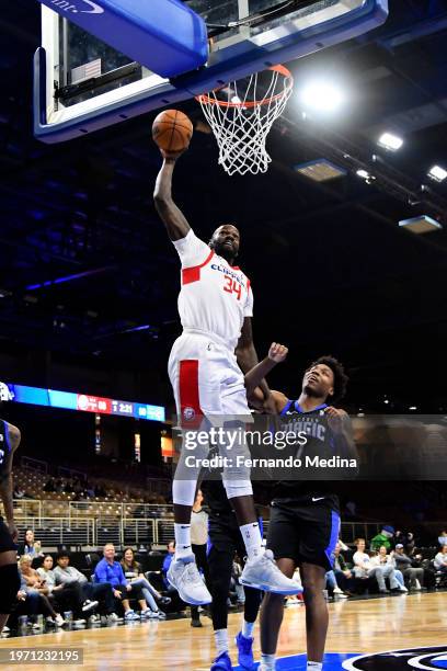 Dewayne Dedmon of the Ontario Clippers dunks the ball during the game against the Osceola Magic on February 1, 2024 at Silver Spurs Arena in...