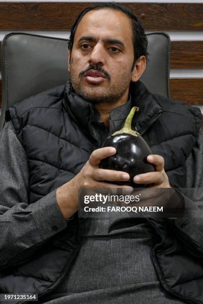 This photograph taken on January 26, 2024 shows Aamir Mughal, member of Pakistan Tehreek-e-Insaf party and an independent election candidate for the...