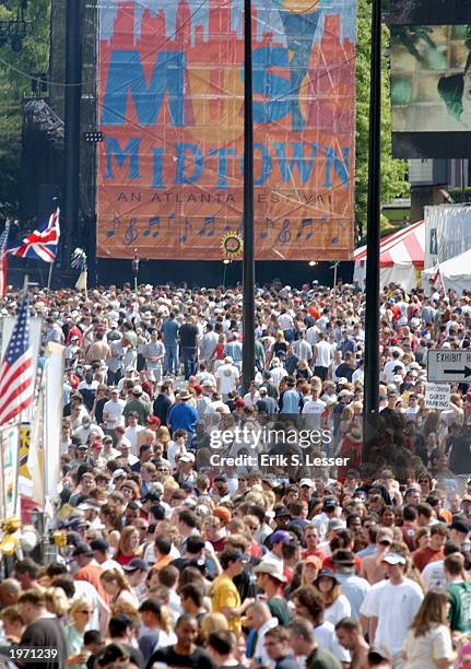 Thousands of music fans crowd into the 10th Annual Music Midtown Festival May 3, 2003 in Atlanta, Georgia. The three-day music festival features a...