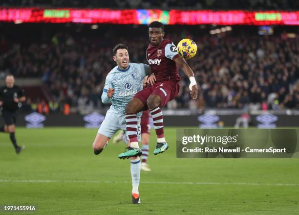 West Ham United's Mohammed Kudus and Bournemouth's Adam Smith during the Premier League match between West Ham United and AFC Bournemouth at London...