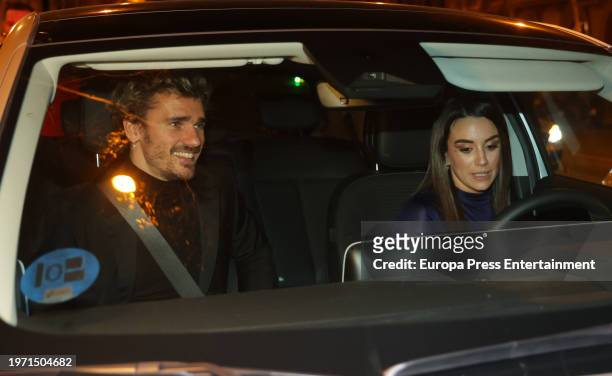 Antoine Griezmann and Erika Choperena leave the inauguration of the exclusive restaurant Rhudo, on January 29 in Madrid, Spain. Rhudo fuses...