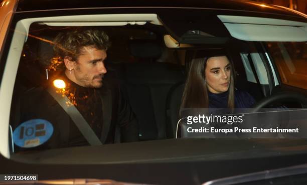 Antoine Griezmann and Erika Choperena leave the inauguration of the exclusive restaurant Rhudo, on January 29 in Madrid, Spain. Rhudo fuses...