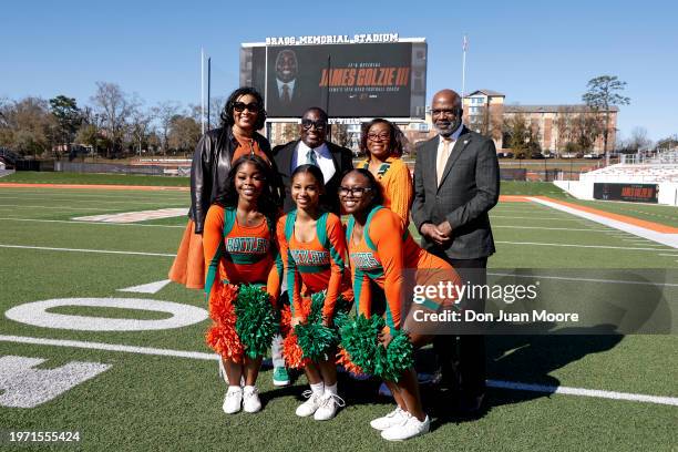 Athletic Director Tiffani-Dawn Sykes, New Head Football Coach James Colzie III, City Commissioner Diane Williams-Cox, President Larry Robinson of...