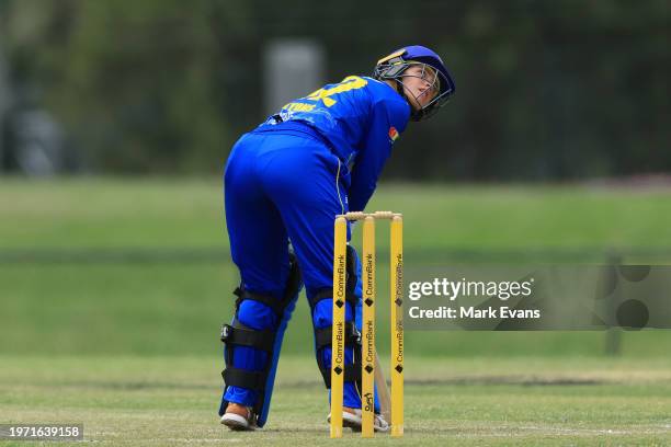 Grace Lyons of the Meteors looks on after being bowled LBW by Lauren Cheatle of the Breakers during the WNCL match between ACT and New South Wales at...