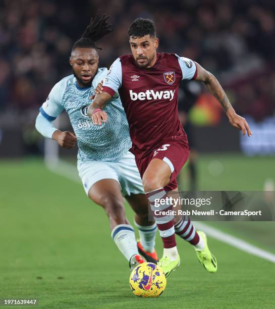 West Ham United's Emerson Palmieri and Bournemouth's Antoine Semenyo during the Premier League match between West Ham United and AFC Bournemouth at...