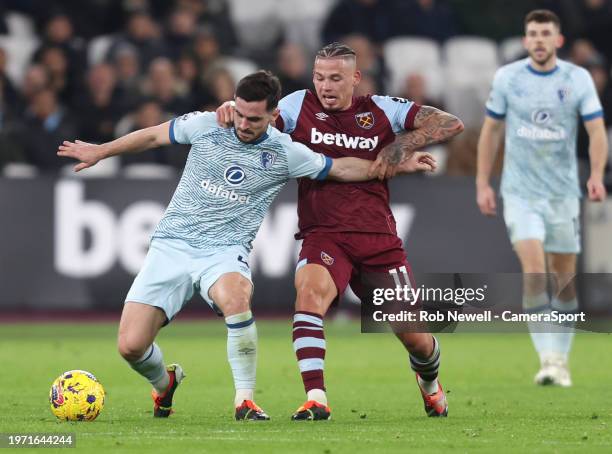 Bournemouth's Lewis Cook and West Ham United's Kalvin Phillips during the Premier League match between West Ham United and AFC Bournemouth at London...