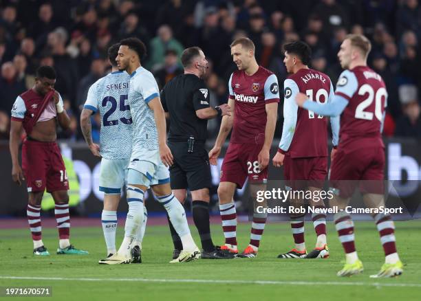 West Ham United's Tomas Soucek in discussion with referee Tim Robinson during the Premier League match between West Ham United and AFC Bournemouth at...