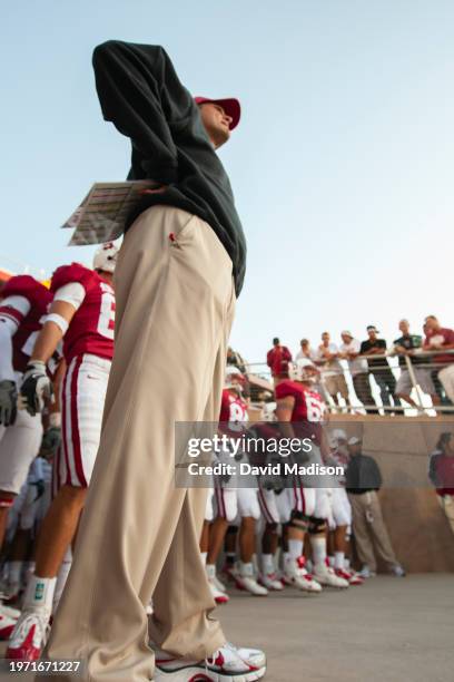 Head Coach Jim Harbaugh of the Stanford Cardinal waits to enter the stadium before an NCAA college football game against the San Jose State Spartans...