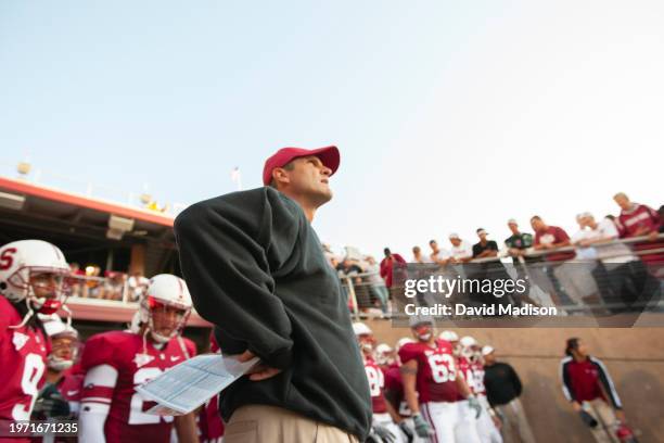 Head Coach Jim Harbaugh of the Stanford Cardinal waits to enter the stadium before an NCAA college football game against the San Jose State Spartans...