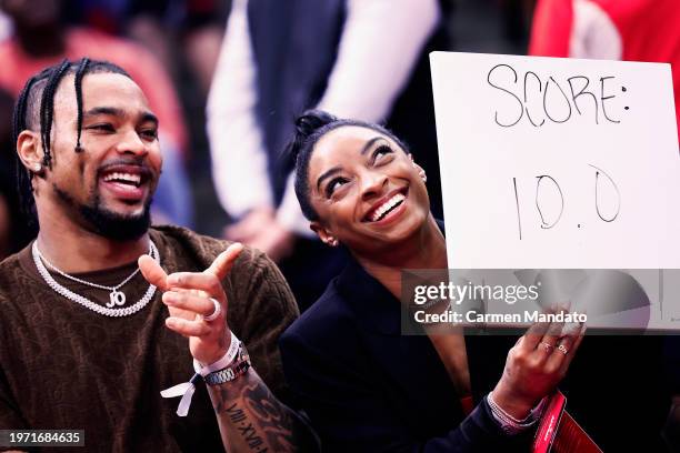 Simone Biles and Jonathan Owens attend a game between the Houston Rockets and the Los Angeles Lakers at Toyota Center on January 29, 2024 in Houston,...