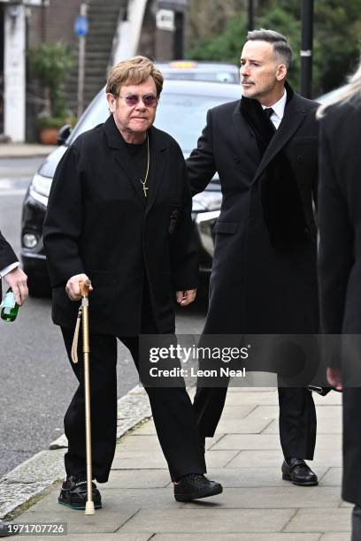 Elton John and David Furnish attend the funeral of Derek Draper at St Mary the Virgin Church, on February 2, 2024 in London, England.