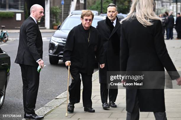 Elton John and David Furnish attend the funeral of Derek Draper at St Mary the Virgin Church, on February 2, 2024 in London, England.