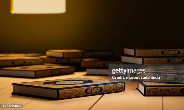 3d, many qurans on the wooden table, islamic concept - the holy al quran with written arabic calligraphy meaning of al quran - arabic calligraphy stock pictures, royalty-free photos & images