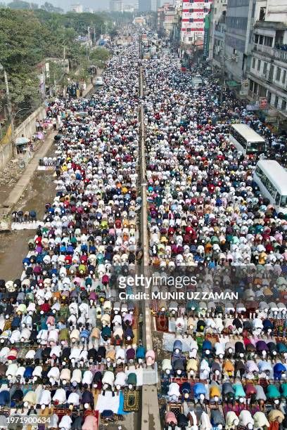 Muslim devotees offer noon prayers at the "Biswa Ijtema" or the World Muslim Congregation in Tongi, on the outskirts of Dhaka on February 2, 2024.