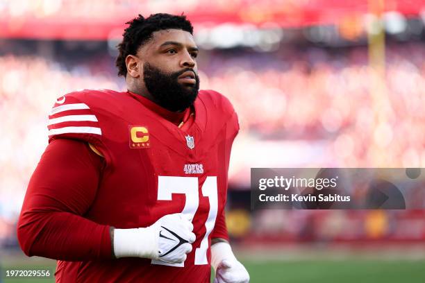 Trent Williams of the San Francisco 49ers jogs to the bench prior to the NFC Championship NFL football game against the Detroit Lions at Levi's...