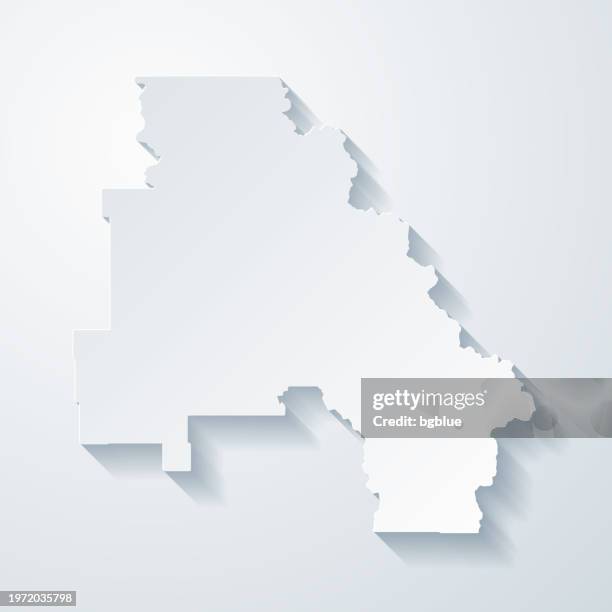 flathead county, montana. map with paper cut effect on blank background - kalispell montana stock illustrations