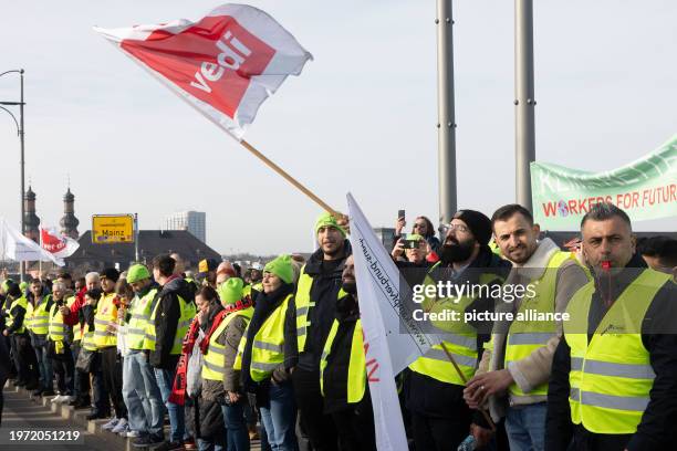 February 2024, Hesse, Wiesbaden: Strikers from the federal states of Hesse, Rhineland-Palatinate and Saarland gather for a rally on the Theodor-Heuss...