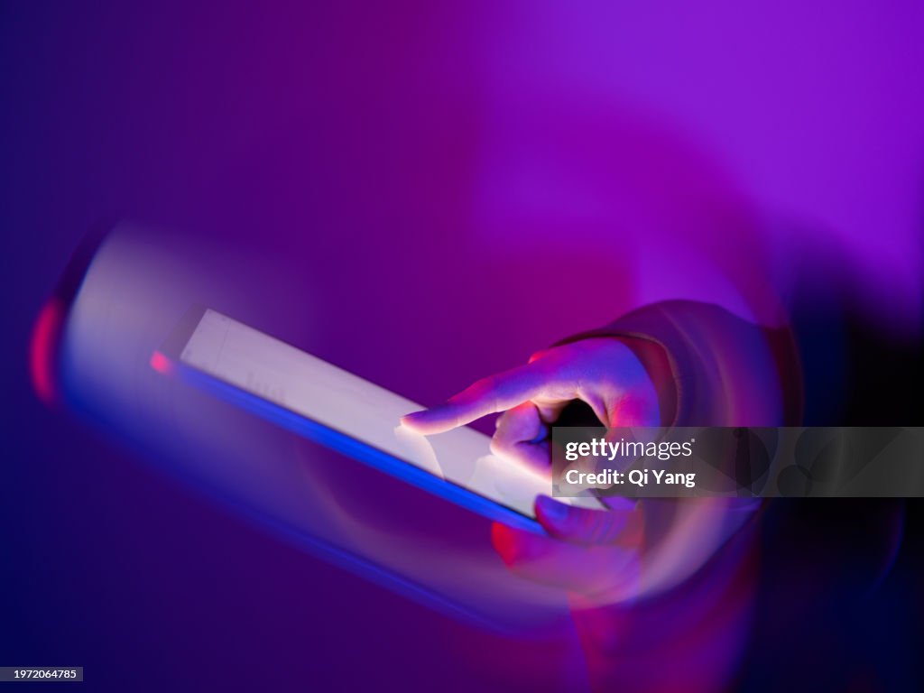 Close-up of using digital tablet