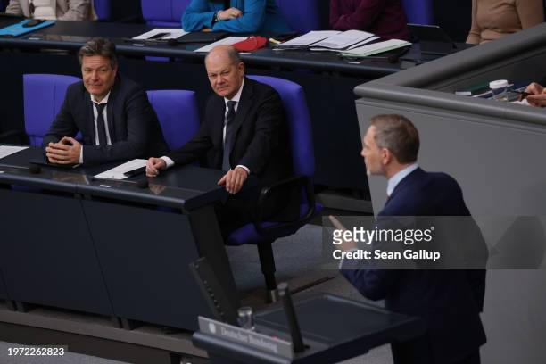 German Federal Finance Minister Christian Lindner speaks during debates about the 2024 federal budget as Chancellor Olaf Scholz and Economy and...
