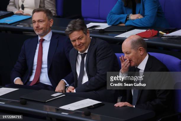 German Federal Finance Minister Christian Lindner, Economy and Climate Action Minister Robert Habeck and Chancellor Olaf Scholz attend debates about...