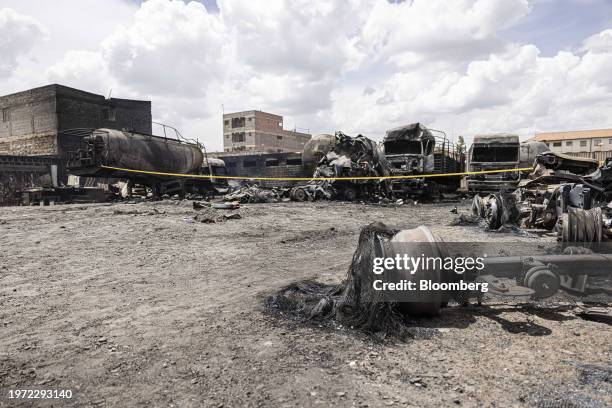 Burnt-out tankers and trucks destroyed following an explosion in the Embakasi district of Nairobi, Kenya, on Friday, Feb. 2, 2024. A vehicle loaded...