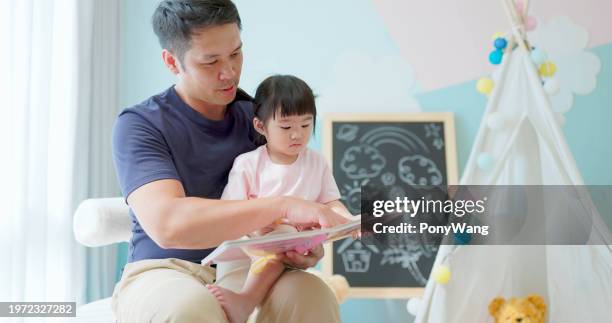 asian father accompany child study - south korean girls stock pictures, royalty-free photos & images