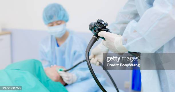 man have gastroscopy exam - esophagogastroduodenoscopy stock pictures, royalty-free photos & images