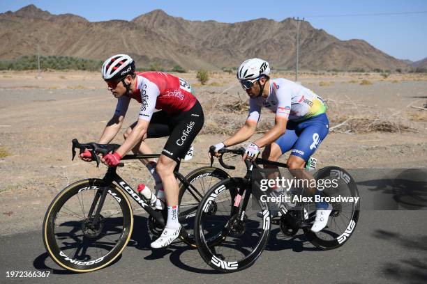 Ben Hermans of Belgium and Team Cofidis and Julien Simon of France and Team TotalEnergies compete during the 4th AlUla Tour 2024, Stage 1 a149.5km...