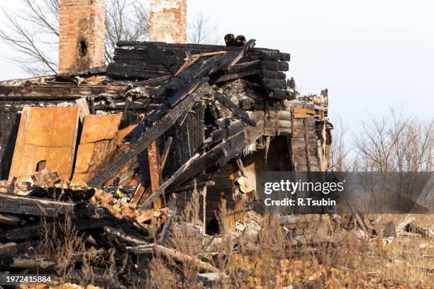 ruins and remains of a burned down house - keep out sign stock pictures, royalty-free photos & images