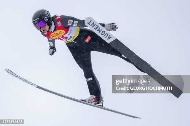 France's Lena Brocard soars through the air during a trial round of the FIS Men's Nordic Combined World Cup in Seefeld, Austria on February 2, 2024....