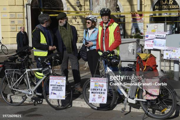 People with bikes, banners and placards protest for a new highway code that introduces the ban on exceeding 30 km per hour in the city, on February...