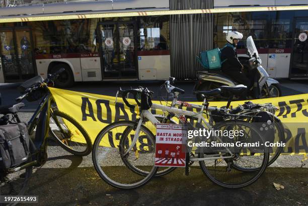 People with banners and placards protest for a new highway code that introduces the ban on exceeding 30 km per hour in the city, on February 2, 2024...