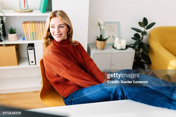 joyful millennial young adult woman relaxing at home office workplace. - nuria stock pictures, royalty-free photos & images